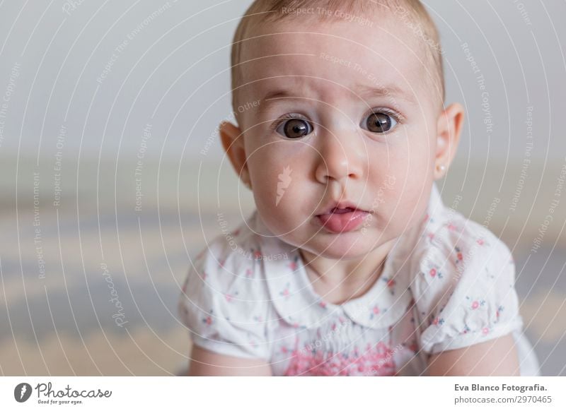 portrait of a beautiful baby girl at home. Family concept indoor Lifestyle Joy Happy Beautiful Face Flat (apartment) House (Residential Structure) Room