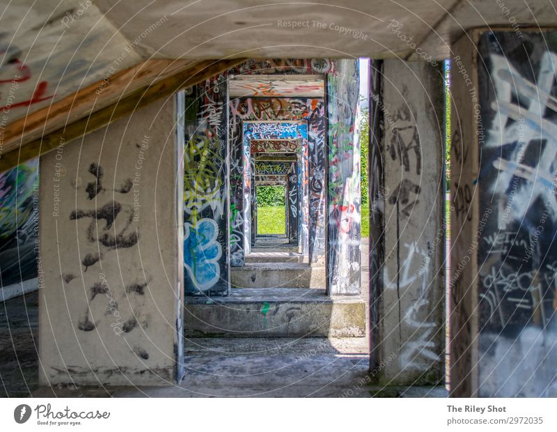 A Tunnel under a Skate Park in Huddersfield, Yorkshire, UK Hooligan Stands Skis Snowboard Sporting Complex Halfpipe Greenhead park England Europe Small Town