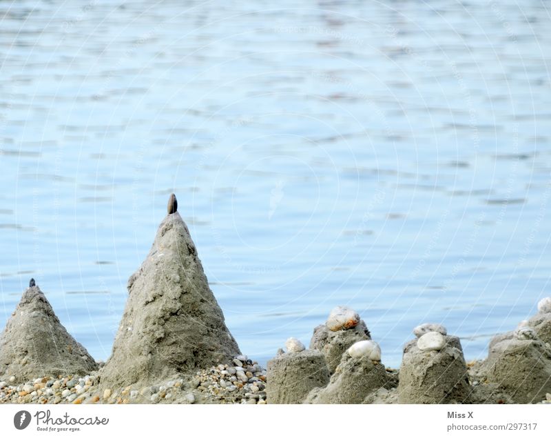 The Sandburg season has begun Playing Vacation & Travel Summer Summer vacation Beach Coast Ocean Build Infancy Sandcastle Sandy beach Pebble Colour photo