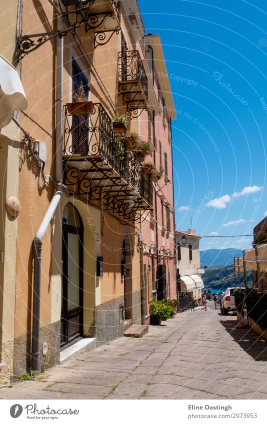 balcony an colorfull houses. vintage street. little village italy sardinia olbia alghero alley bay beach capo castelsardo cliffs coast costa decoration europe