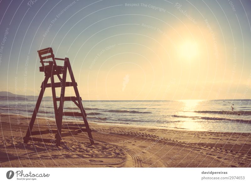 Baywatch chair in empty beach at sunset Exotic Beautiful Life Vacation & Travel Summer Sun Beach Ocean Island Chair Nature Landscape Sand Sky Warmth Coast Wood