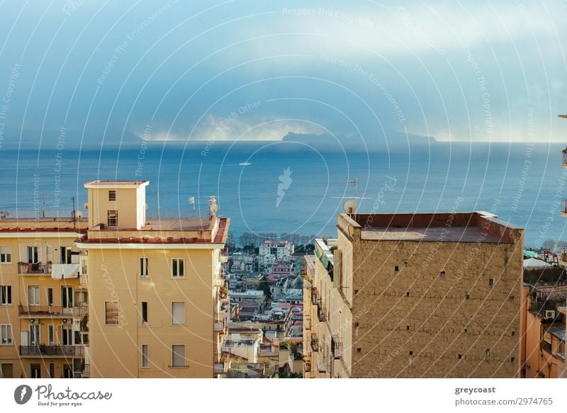 Picturesque scene of Naples, Italy. Clouds over the sea and city coast with houses Ocean House (Residential Structure) Sky Coast Town Building Architecture