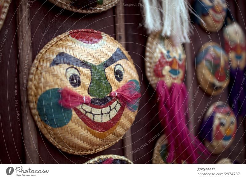 Souvenir masks at a Hanoi marketplace close up Exhibition Marketplace Moustache Beard Smiling Vietnam Basket orogonal Domestic Horizontal no person Colour photo