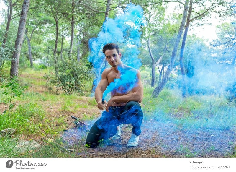 Young bare man in colored smoke outdoors in the forest Style Happy Beautiful Vacation & Travel Freedom Summer Ocean Human being Masculine Boy (child) Young man