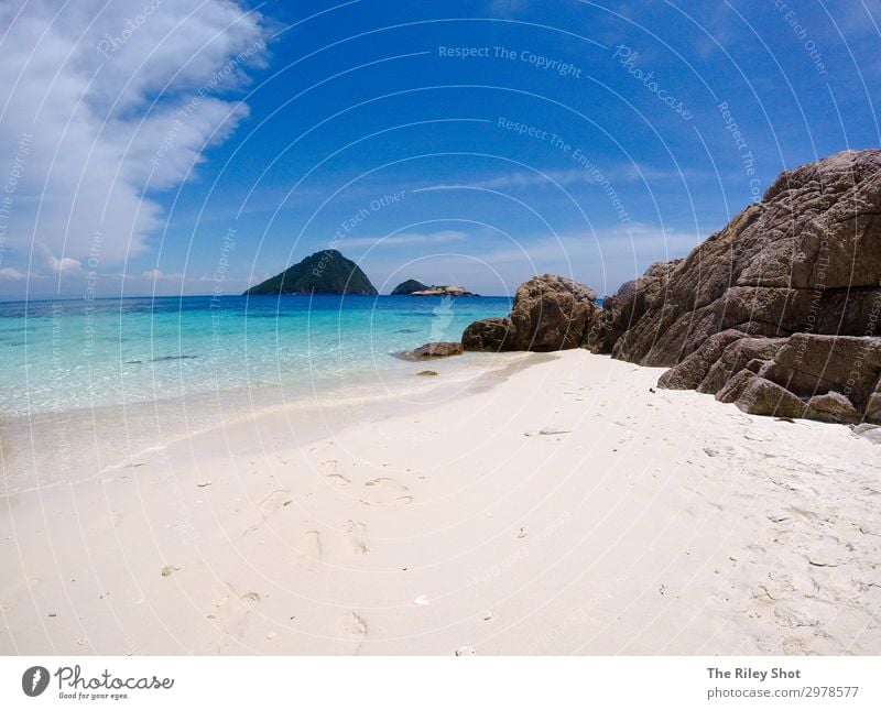 A view of a isolated beach and blue waters Beautiful Relaxation Vacation & Travel Tourism Adventure Summer Beach Ocean Island Nature Landscape Sand Sky Clouds