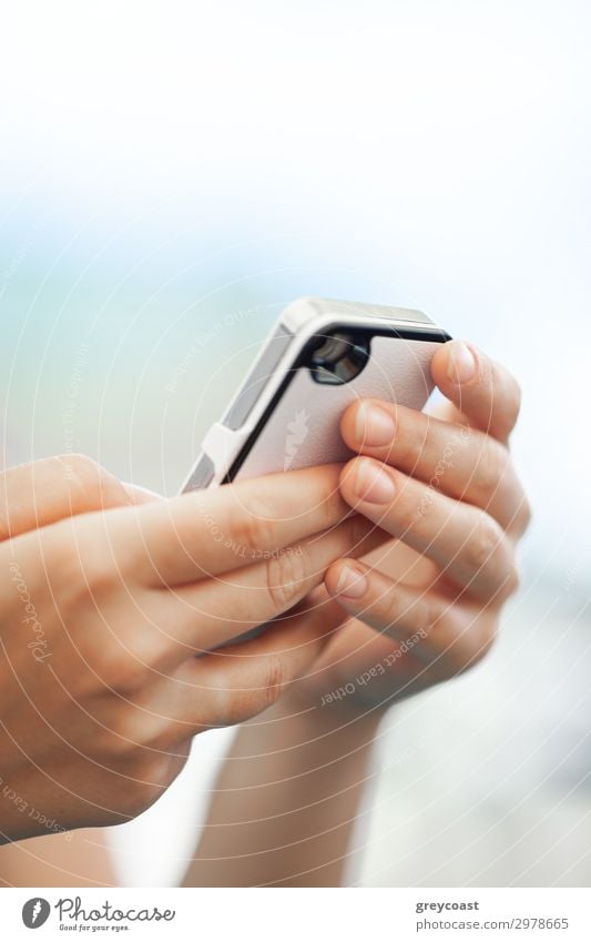 Close-up shot of woman with cell outdoor. Using smart phone for chatting, surfing the net and social media Telephone PDA Internet Human being Feminine Woman