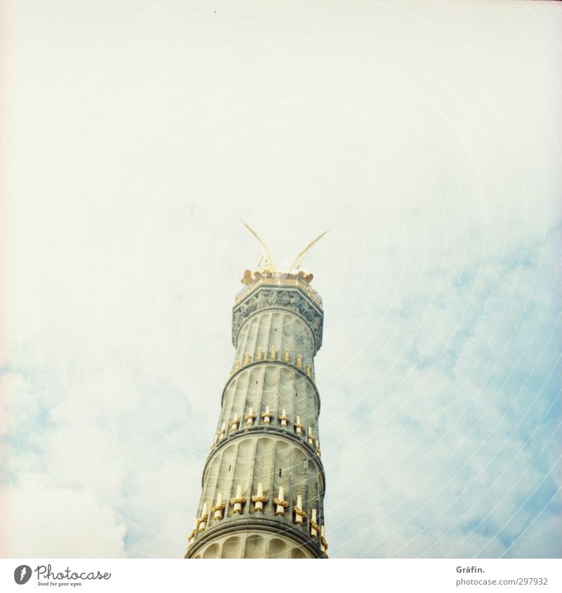 Victoria Tourism Capital city Manmade structures Landmark Monument Victory column Large Historic Tall Blue Gold White Symmetry Tradition Sky Colour photo