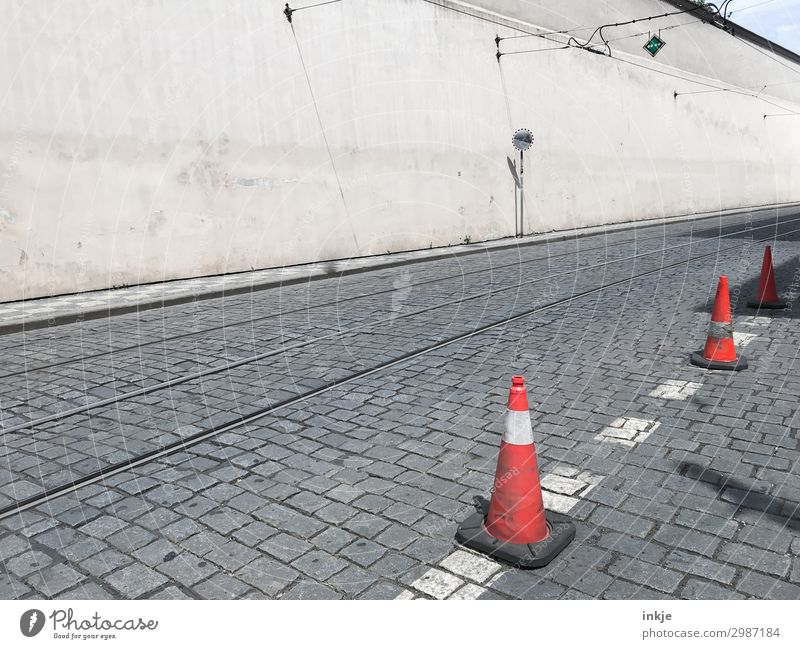 tram tracks Deserted Wall (barrier) Wall (building) Transport Traffic cone Rail transport Commuter trains Tram Railroad tracks Railroad system Road sign