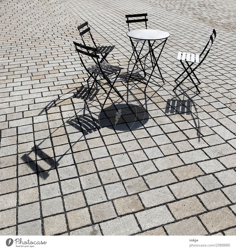 Prague street café Lifestyle Restaurant Going out Café Gastronomy Sidewalk café Deserted Places Folding chair Chair Table Garden table Pave Stone Metal