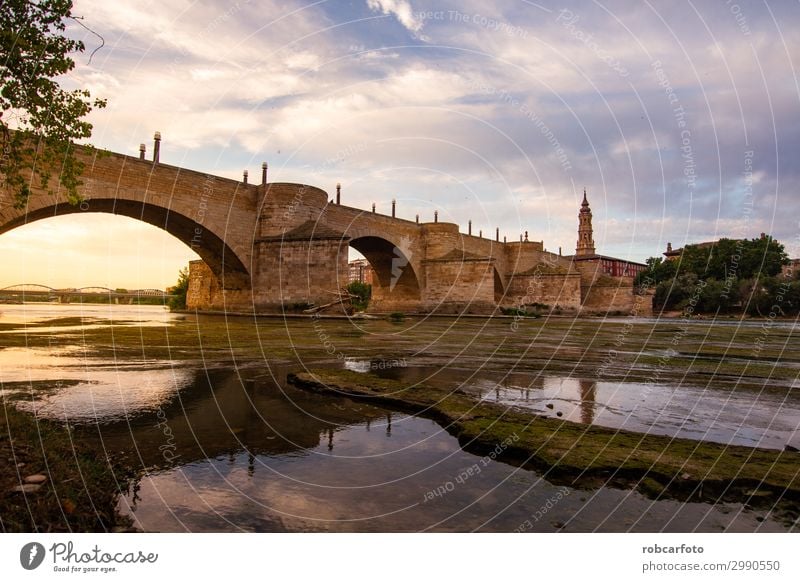 Ebro river passing through Zaragoza Vacation & Travel Tourism Culture Landscape Sky River Church Places Bridge Building Architecture Monument Stone Old Historic