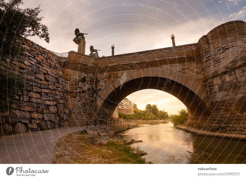 Ebro river passing through Zaragoza Vacation & Travel Tourism Culture Landscape Sky River Church Places Bridge Building Architecture Monument Stone Old Historic