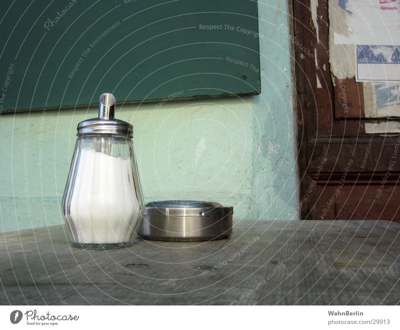 Table in the café Wood Ashtray Still Life Rustic Things Metal Glass Sugar caster Exterior shot