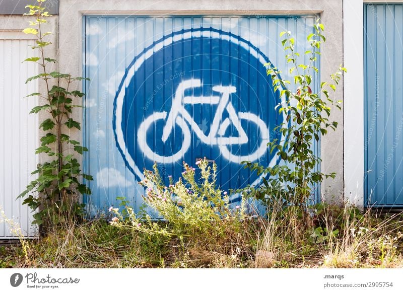 Bicycle friendly Nature Bushes Garage Garage door Signs and labeling Road sign Graffiti Sustainability Environmental protection CO2 emission Colour photo