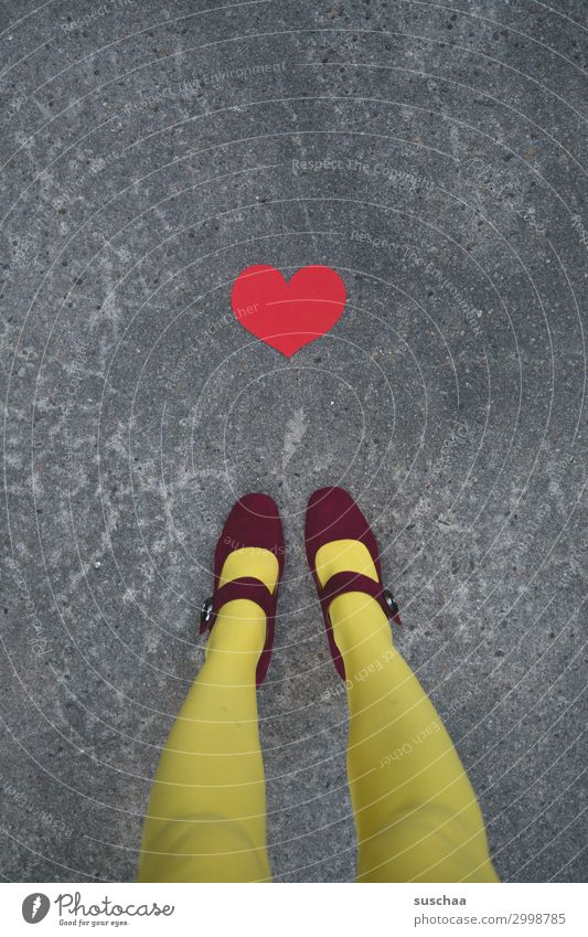 Heartfelt Sincere Red Yellow Love Friendship Compassion Connectedness Many Legs Feet Woman feminine Street Asphalt Whimsical Communication embassy world peace