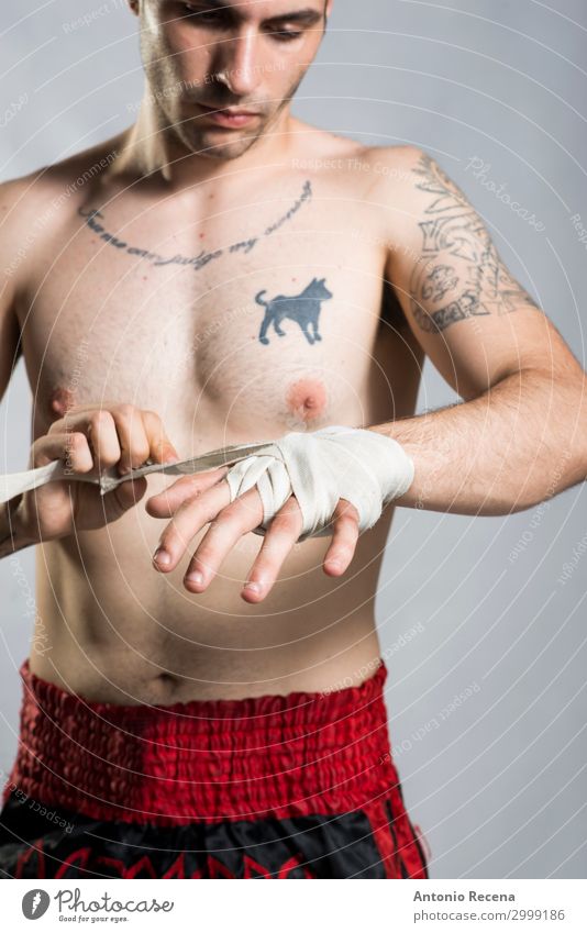 Young man posing in studio shot Sports Boy (child) Man Adults Ring Tattoo Aggression Muscular Strong Anger Power Protection Force Thai boxer Perspire fight Kick