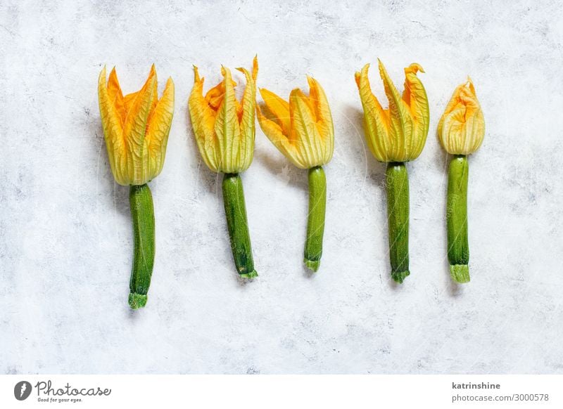 Young Zucchini With Flowers Vegetable Vegetarian diet Fresh Above Yellow Green courgette Italian Farmers market orange Cooking Culinary Harvest healthy