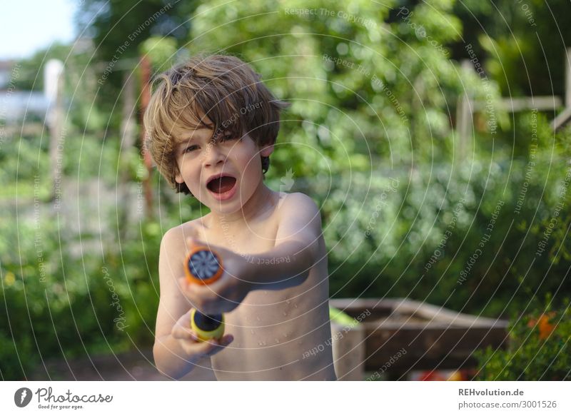 Water march - boy with water pistol Playing Vacation & Travel Summer Summer vacation Living or residing Flat (apartment) Human being Child Boy (child) Infancy 1