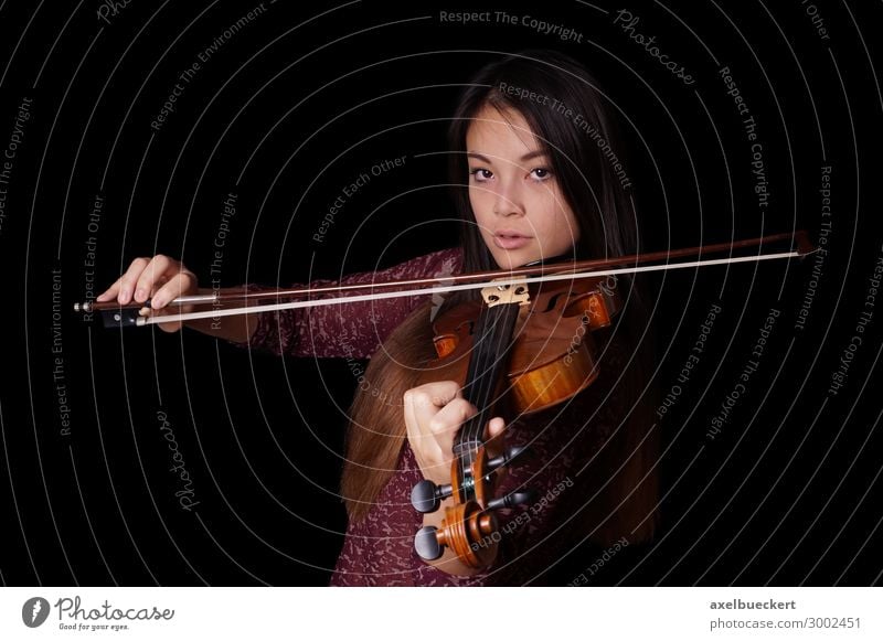 young Asian plays violin Lifestyle Leisure and hobbies Music Human being Feminine Young woman Youth (Young adults) Woman Adults 1 13 - 18 years 18 - 30 years