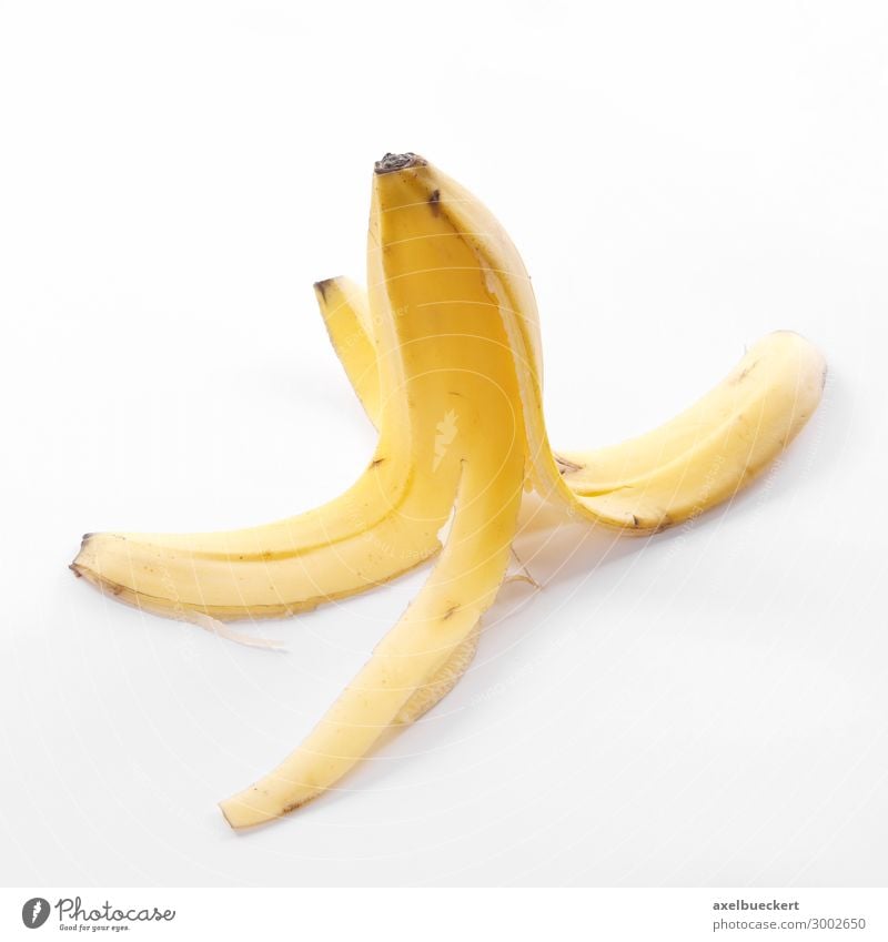 banana skin Food Fruit Nutrition Vegetarian diet Yellow Symbols and metaphors Banana Banana skin Slip Risk Slapstick Throw away Bright background Colour photo