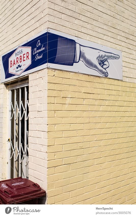 Barber Shop this way... Style Personal hygiene Hair and hairstyles Melbourne Wall (barrier) Wall (building) Sign Characters Signs and labeling Hip & trendy Town