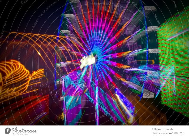 Long exposure fairground and Ferris wheel funfair Brilliant Muddled Dark Night Light Tracer path Fairs & Carnivals Feasts & Celebrations Speed Movement Carousel