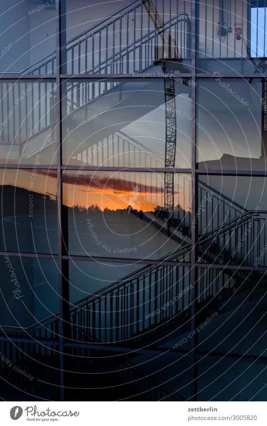 Stairs with sunset Facade Window Glazed facade Glas facade Glass Mirror image Reflection Staircase (Hallway) Landing Descent Go up Handrail Banister Deserted