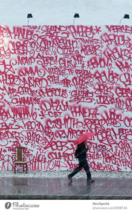 red & red Human being Masculine Man Adults 1 30 - 45 years Bad weather Rain Manhattan Downtown Populated Manmade structures Building Wall (barrier)