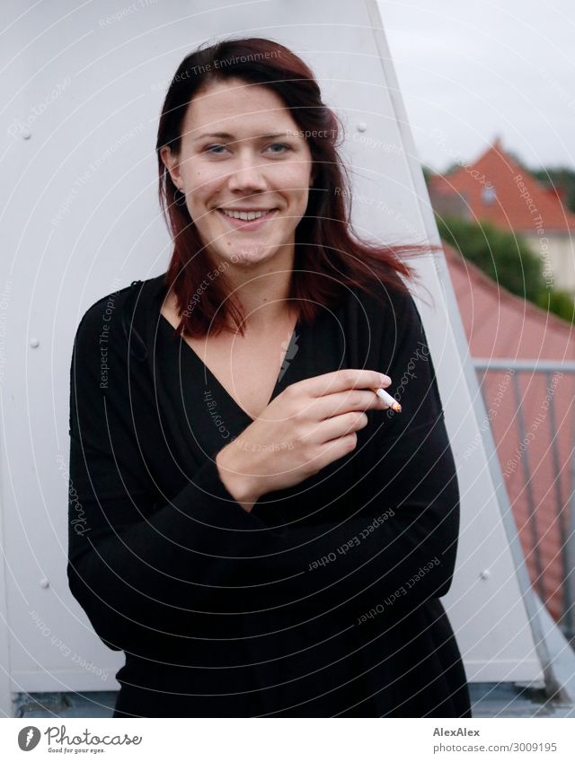 Portrait of a young woman standing on her balcony and smoking Tobacco products Lifestyle Joy already Relaxation House (Residential Structure) Balcony