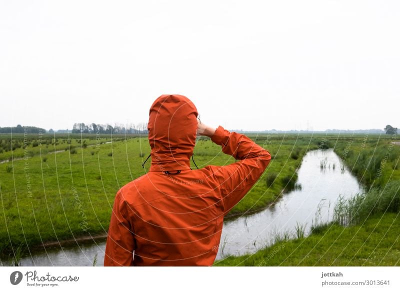 View into the distance Human being 1 Environment Nature Landscape Water Horizon Meadow Brook Observe Looking Stand Wait Curiosity Orange Anticipation Optimism