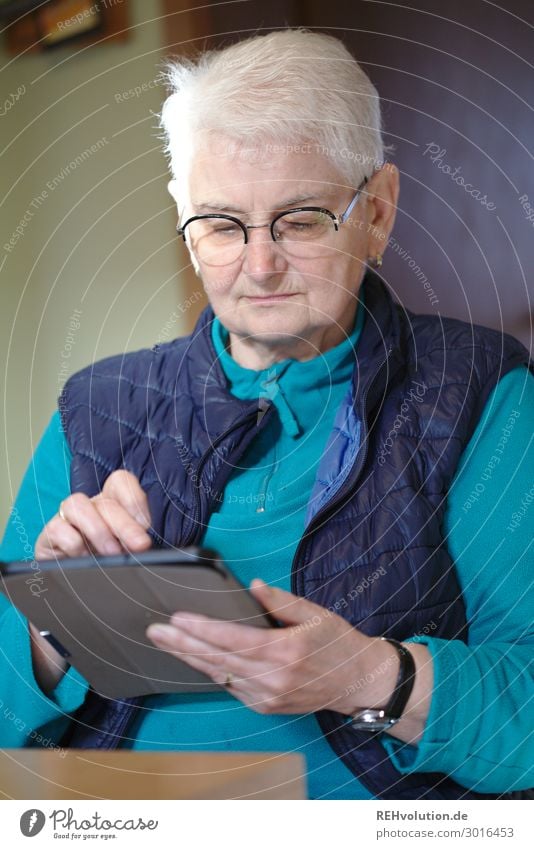 Senior uses tablet Tablet computer Technology Entertainment electronics Advancement Future High-tech Internet Human being Feminine Woman Adults Female senior