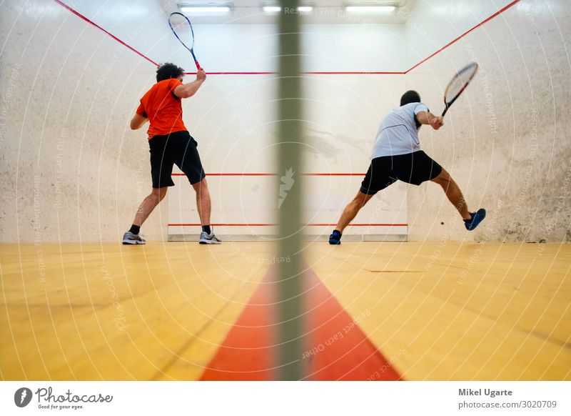 Two friends playing squash in Mutilva, Navarra, Spain Joy Relaxation Leisure and hobbies Playing Sports Closing time Woman Adults Man Friendship Breathe