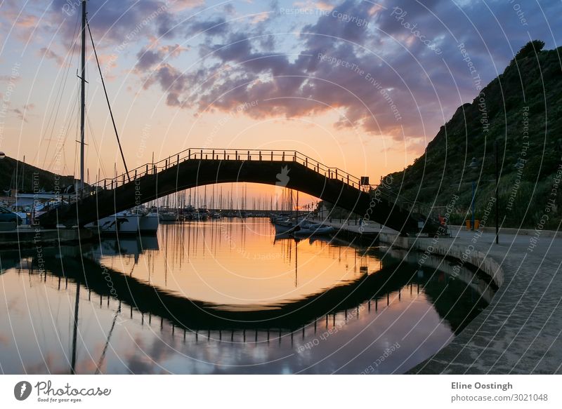 bridge over water. castelsardo sardinia italy harbour. sunset reflection architecture bay beach beautiful blue boat castle city coast colorful europe famous