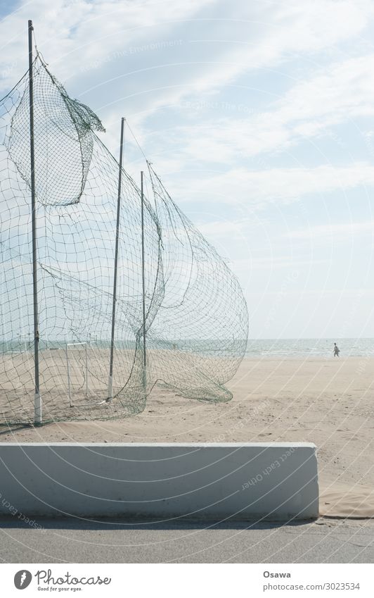 Ball catching net on the beach Beach Ocean Sports Ball sports Net Wind Sand Sky Water Clouds Horizon Human being To go for a walk Wall (barrier) Promenade