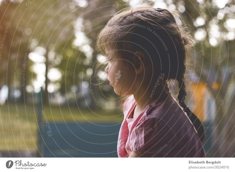 Girl looks out of the window dreaming Longing Dream Observe Child Think Toddler Infancy Summer Sit Natural Calm Loneliness Colour photo