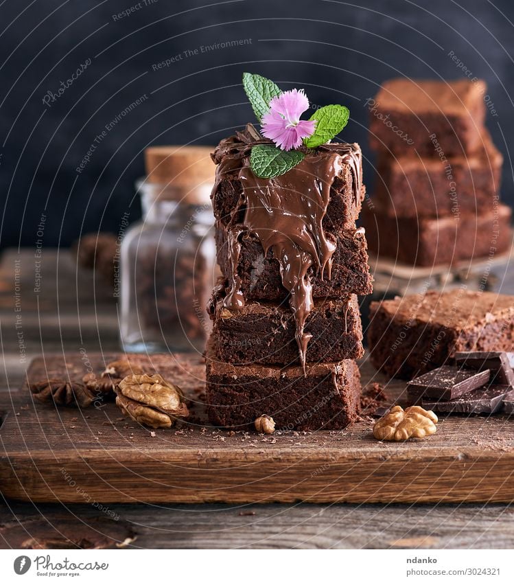 stack of square pieces of baked brownie pie Cake Dessert Nutrition Diet Hot Chocolate Table Kitchen Wood Eating Dark Fresh Delicious Soft Brown Black Baking