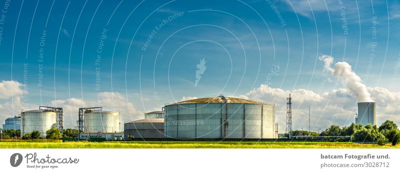 Tank farm refinery with power plant in the background Energy industry Industry Environment Landscape Climate change Beautiful weather Rostock Deserted