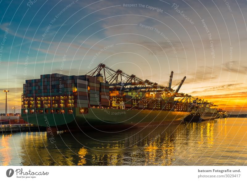 Container ship in the port of Hamburg at sunset Landscape Night sky Sunrise Sunset Spring Summer Autumn Coast River bank Transport Navigation Harbour Beautiful