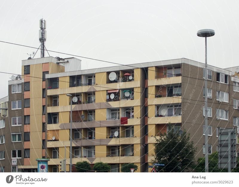 Post-war Modernism I Kassel Town Downtown Deserted High-rise Facade Balcony Living or residing Sharp-edged Yellow Gray Prefab construction Colour photo