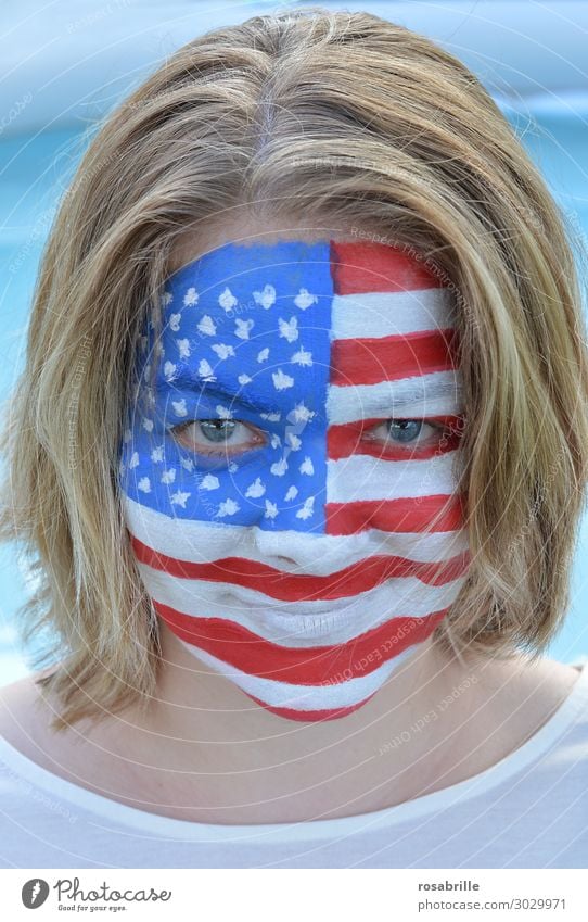 american girl - young blonde woman with american flag painted on face Face Make-up Fan Human being Woman Adults Mask Flag Elections smile Laughter