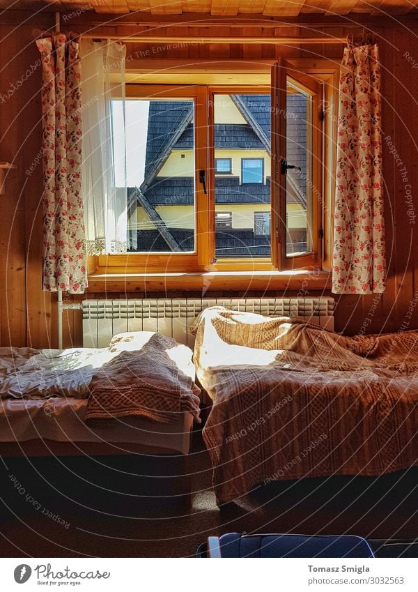 A warm moody room, wooden guesthouse, messy sheets, two beds Lifestyle Harmonious Well-being Relaxation Calm Living or residing House (Residential Structure)