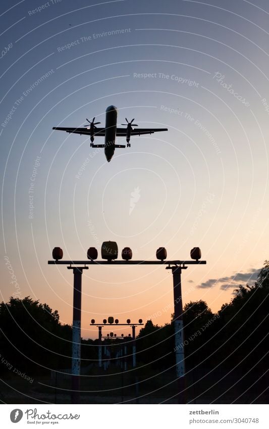 The last plane Berlin Motion blur Carbon dioxide Airplane Flying Aviation Floating Airport Airfield Worm's-eye view Sky Heaven Landing Airplane landing Deserted