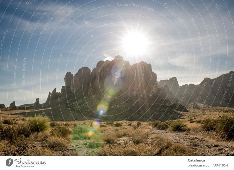 Superstition Mountains Landscape Nature Desert Sky Sun Sunlight Environment Sand Light Drought Clouds cactus Thorn bushes path Day daylight Blue Brown Hiking