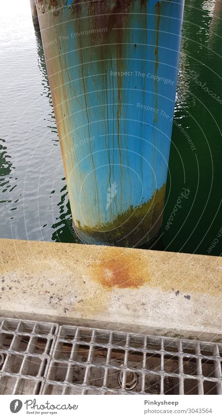 Rust on post Ocean Nature Landscape Water Coast Baltic Sea Lake Concrete Blue Brown Turquoise Patient Calm Rescue Footbridge Pole Metal grid Line Colour photo