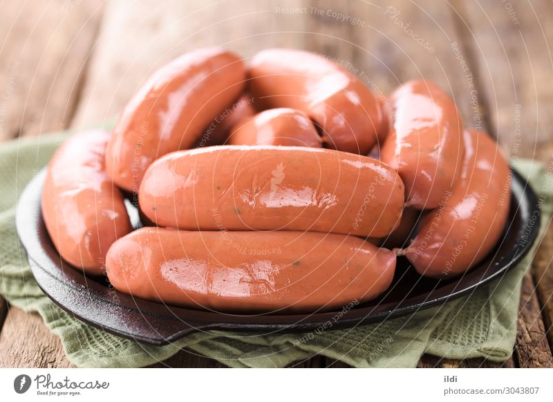 Sausage or Bratwurst Meat Fresh food chorizo longaniza Ground minced Pork Beef Processed preserved bbq barbecue Cooking casing iron Cast iron Horizontal