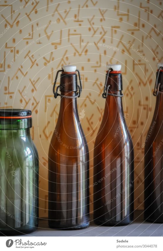 Old clip-on bottles with preserving jar Wallpaper Room Pantry Bottle Neck of a bottle Bottle lid Preserving jar Glass Authentic Good Historic Original Retro