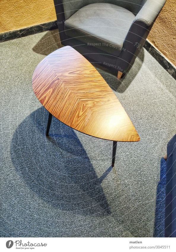 joiner's Deserted Brown Gray Armchair Table Round Carpet Tabletop table leg Linoleum Colour photo Subdued colour Interior shot Close-up Detail Copy Space left