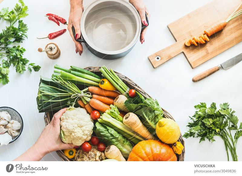 Female hands prepare various colorful organic farm vegetables Food Vegetable Nutrition Organic produce Vegetarian diet Diet Crockery Shopping Design