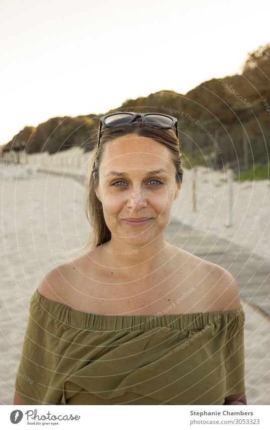 Woman at the beach Feminine 1 Human being Beautiful pretty golden hour sand blue eyes tan summer warmth Sunglasses happy Colour photo Exterior shot Evening