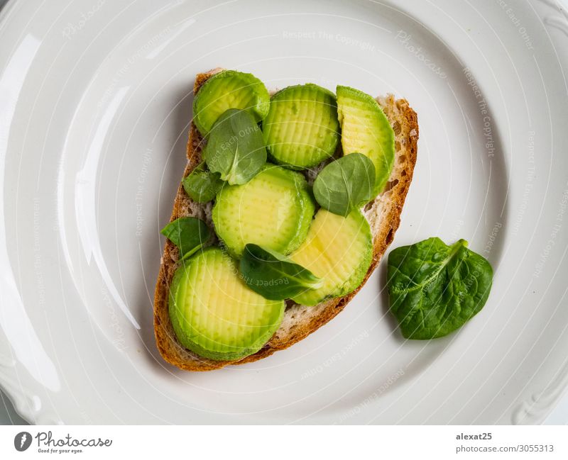 Avocado toast in a plate Vegetable Fruit Bread Nutrition Breakfast Lunch Vegetarian diet Fresh Natural Green appetizer avocado background brunch food Gourmet