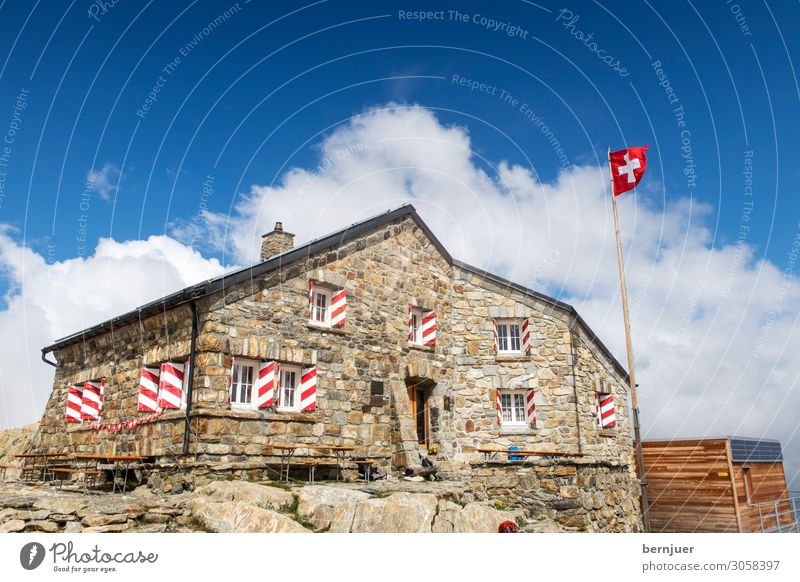 mountain hut Vacation & Travel Mountain Hiking Nature Landscape Weather Alps Hut Roof Stone Flag Old tierbergli hut funffingerstock sky Alpine hut hike summit